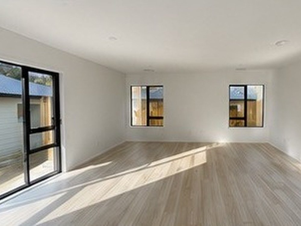 Living area after interior painting in a Wellington new-build